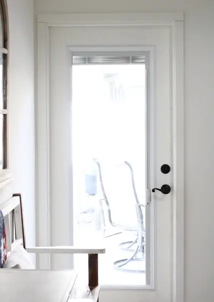 white door with full glass window in garage conversion