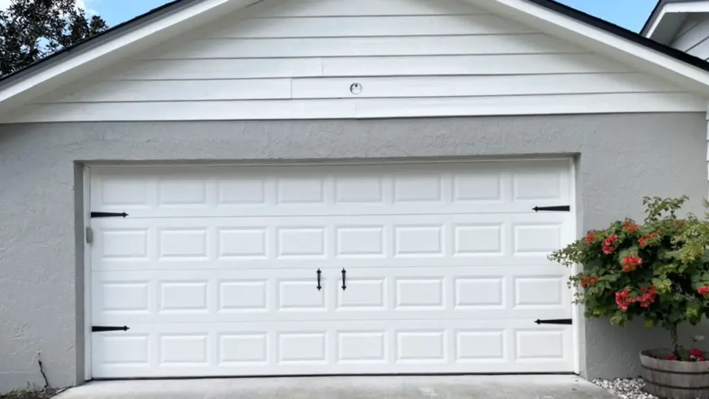 white garage door with grey house and black accents on door