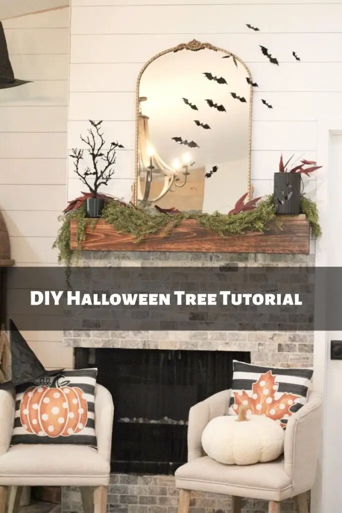 Black Halloween tree with black bats on it on a wood fireplace mantle with a gold mirror and black bats on it and across the wall, with the words DIY Halloween Tree Tutorial written across. 