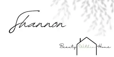 Black cursive text that says Shannon and at the bottom black and green text that says Beauty Within Home and an outline of a house. 